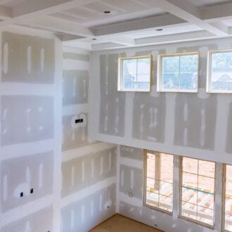 plastering-drywall-new-home-industry-finishing-putty-room-walls-plasterboards-scaled-330x330